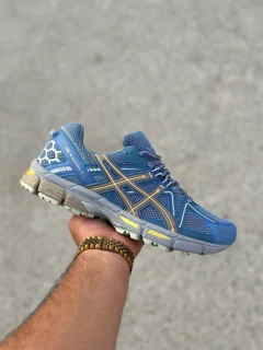 کفش مدل asics آبی خط زرد زیره ویبرام اورجینال وارداتی